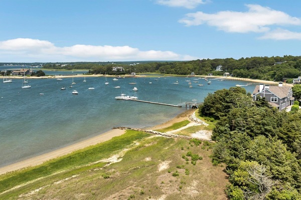 Soak in the scenic beauty of the protected bay on Scraggy Neck. Please note: the beach is not directly outside the home, but access is included with your stay.