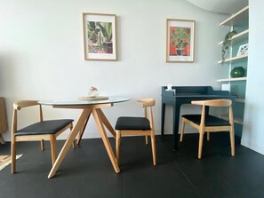 Enjoy meals in this stylish dining area with a round table and four comfortable chairs.