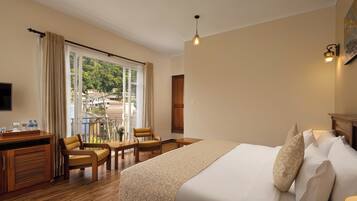 Deluxe Double Room, Balcony, Mountain View | In-room safe, desk, laptop workspace, blackout drapes