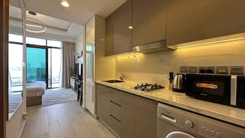 Apartamento de lujo, vistas a la ciudad | Cocina privada