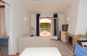 Apartment | Living room | Fireplace - Apartment Near Els Griells Beach (Torroella de Montgrí)