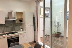 Private kitchen - Tombarolo three-room apartment 150 m from the sea (Lido di Pomposa)