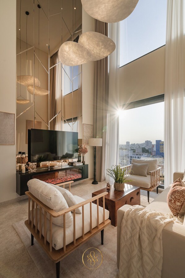 Smart TV, fireplace, books, offices