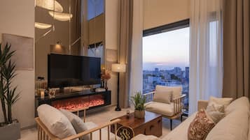 Smart TV, fireplace, books, offices