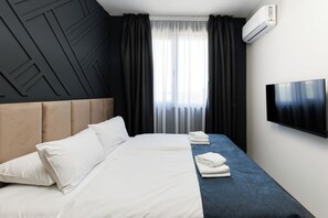 Apartament Deluxe | Habitacions insonoritzades, planxa i posts de planxar i wifi gratuïta 