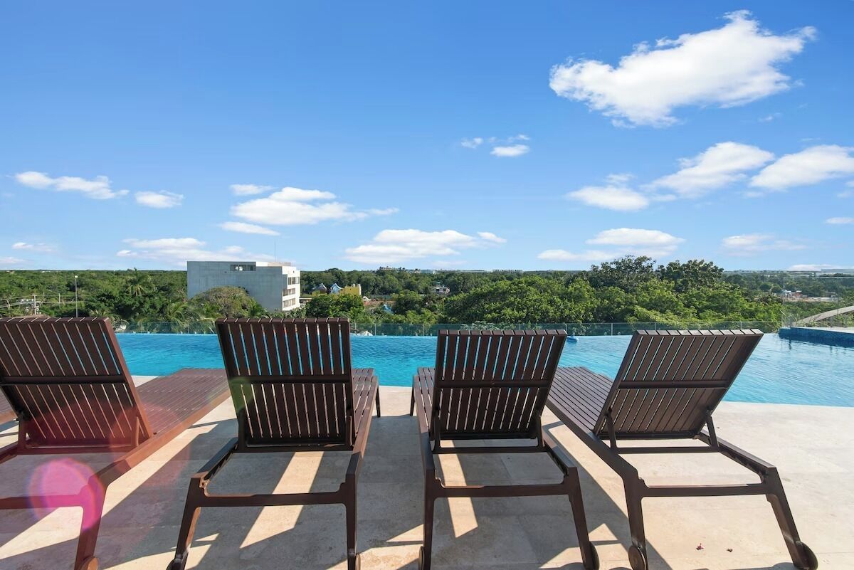 Departamento, 1 habitación, balcón, vista a la ciudad | Alberca | Alberca al aire libre 