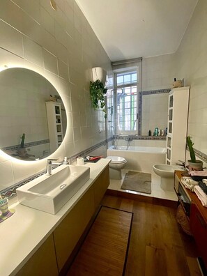 Hair dryer, bidet, towels, soap