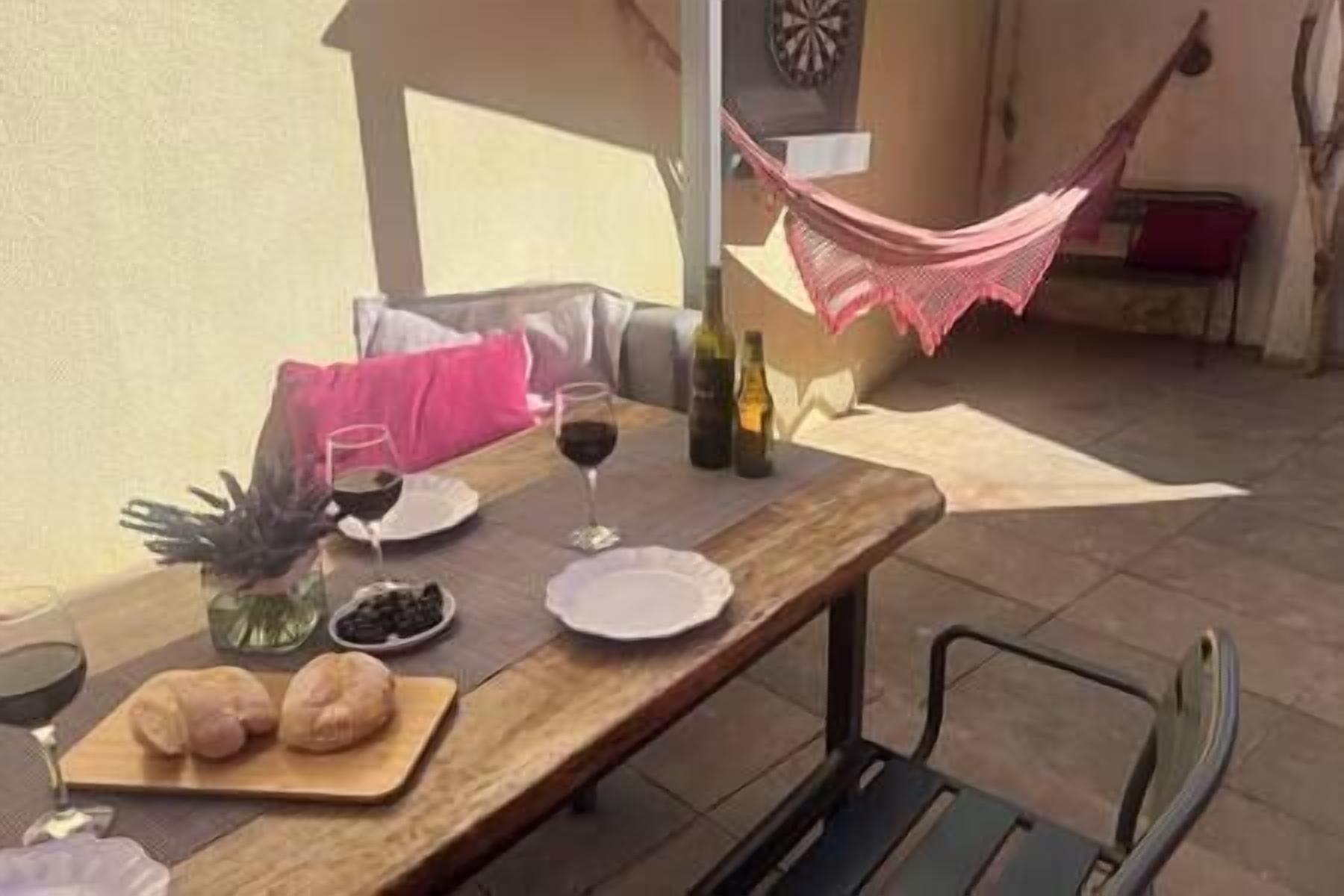 terrace (dining table, work area & hammock)