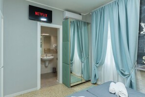 Økonomi-enkeltrom | Safe på rommet, blendingsgardiner, wi-fi (inkludert) og sengetøy