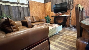 Vila, 5 quartos, acessível, sacada | Área de estar