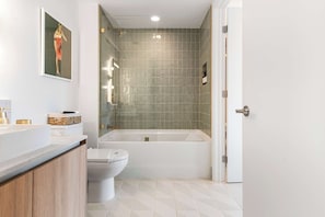 Shower, hair dryer, towels, shampoo