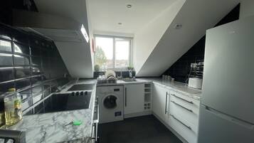 Apartment | Private kitchen | Fridge, microwave, oven, stovetop