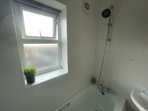Apartment | Bathroom | Combined shower/tub, deep soaking tub, towels, toilet paper