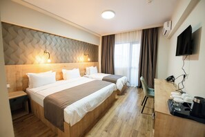 Family Room | 1 bedroom, in-room safe, desk, iron/ironing board