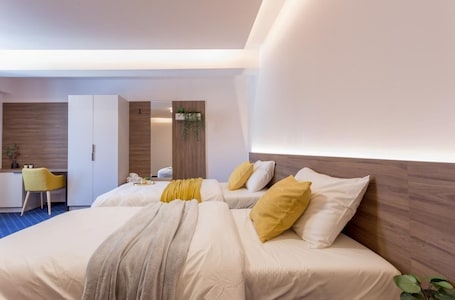 Superior Twin Room, City View | Minibar, desk, laptop workspace, soundproofing
