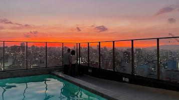 Outdoor pool, open 8:00 AM to 10:00 PM, sun loungers