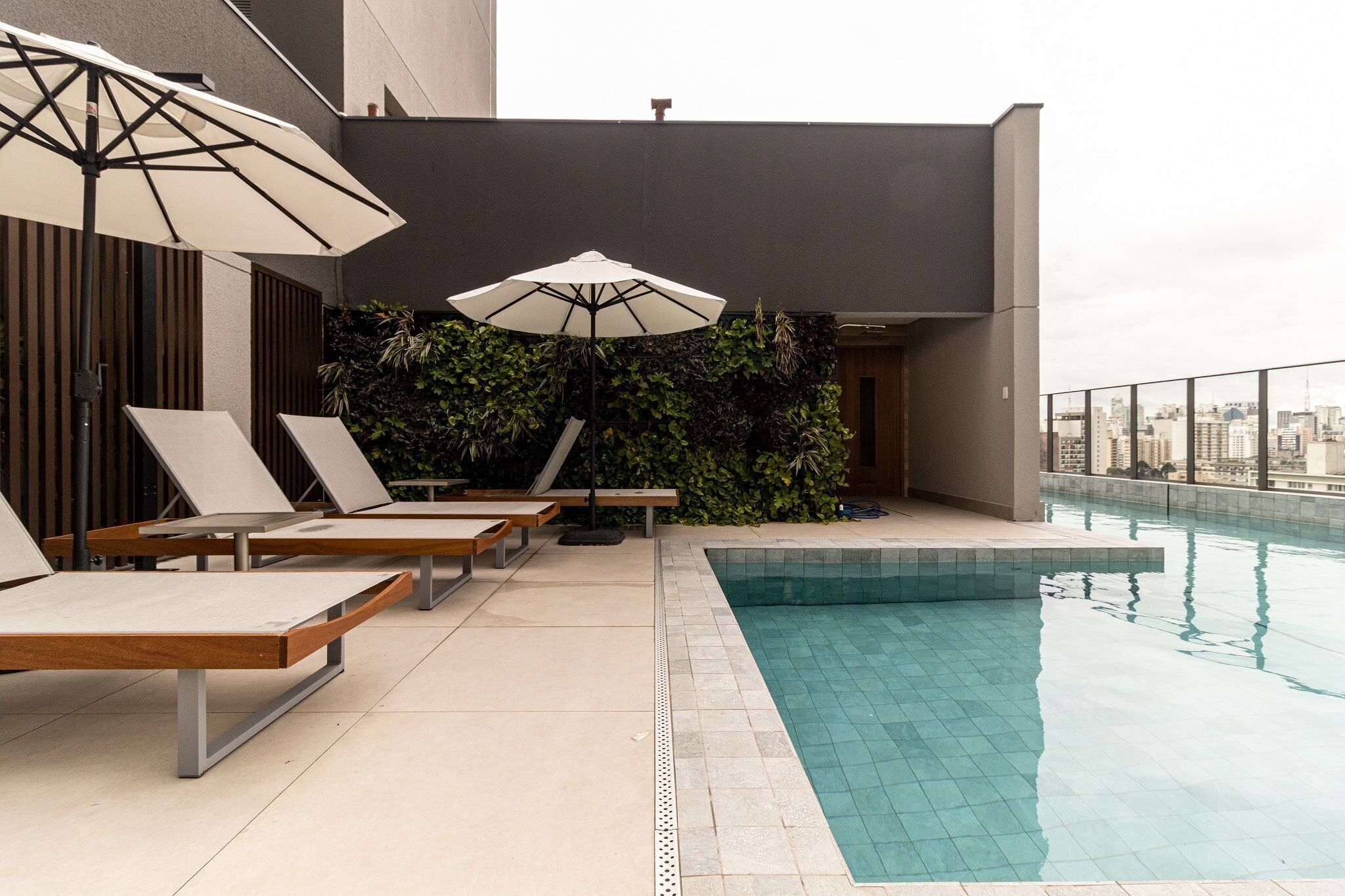 Outdoor pool, open 8:00 AM to 10:00 PM, sun loungers