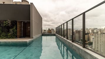 Outdoor pool, open 8:00 AM to 10:00 PM, sun loungers