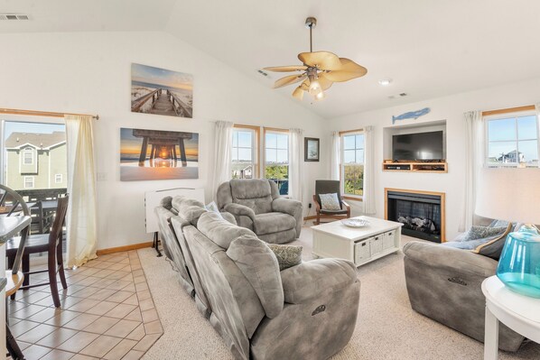 Smart TV, chimenea, reproductor de DVD y futbolito 