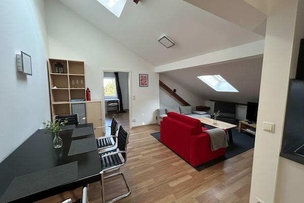 Wohnzimmer mit Schlafsofas