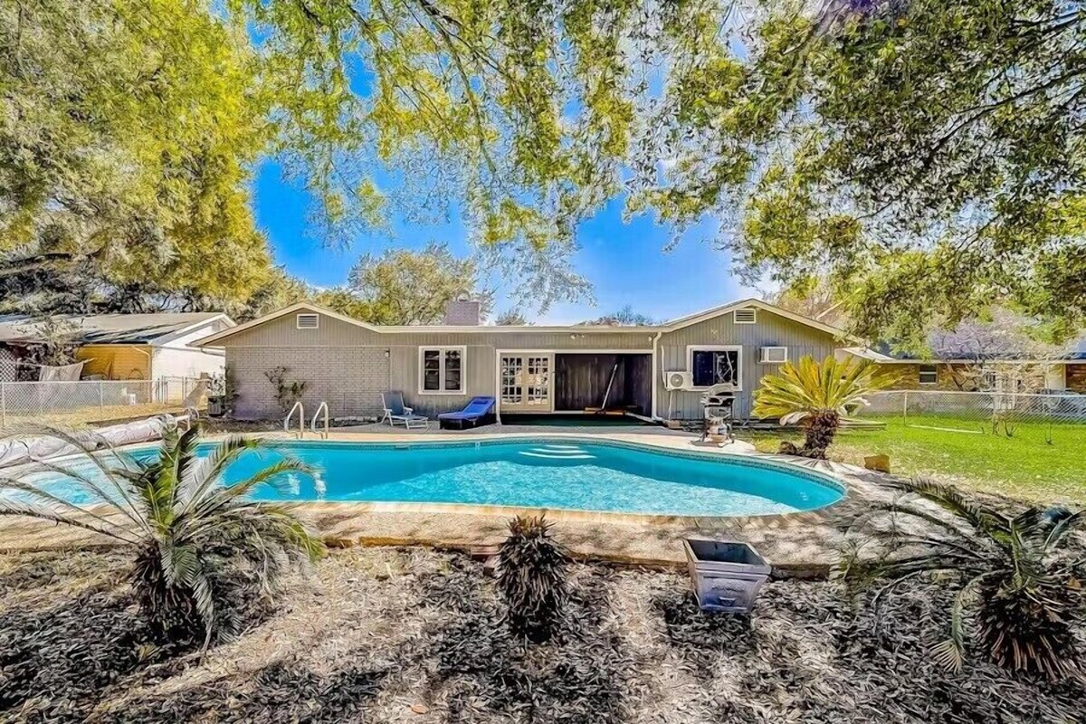 Inviting home with heated pool and dog-friendly