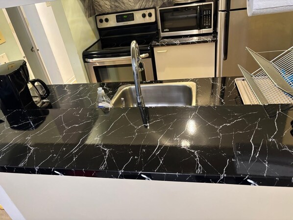 Private kitchen - Cozy little apartment 2 bedrooms (Montréal)