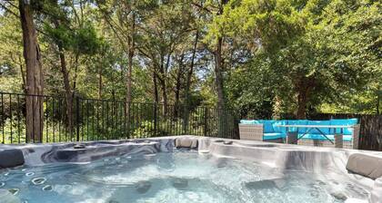 This beautiful 3200 SF single storey with loft backs onto a heavily treed forest