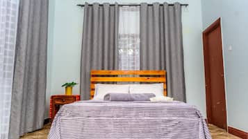 Apartment, Balcony, Garden View | 2 bedrooms, individually decorated, individually furnished, desk