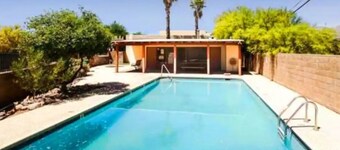 Cozy 2-bedroom townhome in charming Tucson with AC, WiFi. Located NW of Tucson .