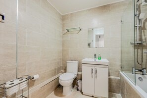 Hair dryer, towels, soap, toilet paper