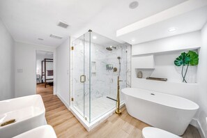 Shower, hair dryer, towels, soap