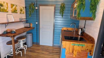 Fridge, microwave, stovetop, coffee/tea maker