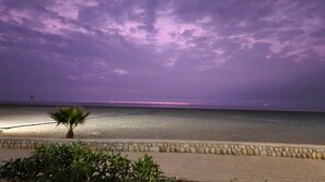 On the beach, sun-loungers