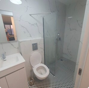 Hair dryer, towels, toilet paper