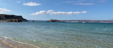 Una spiaggia nelle vicinanze, teli da spiaggia