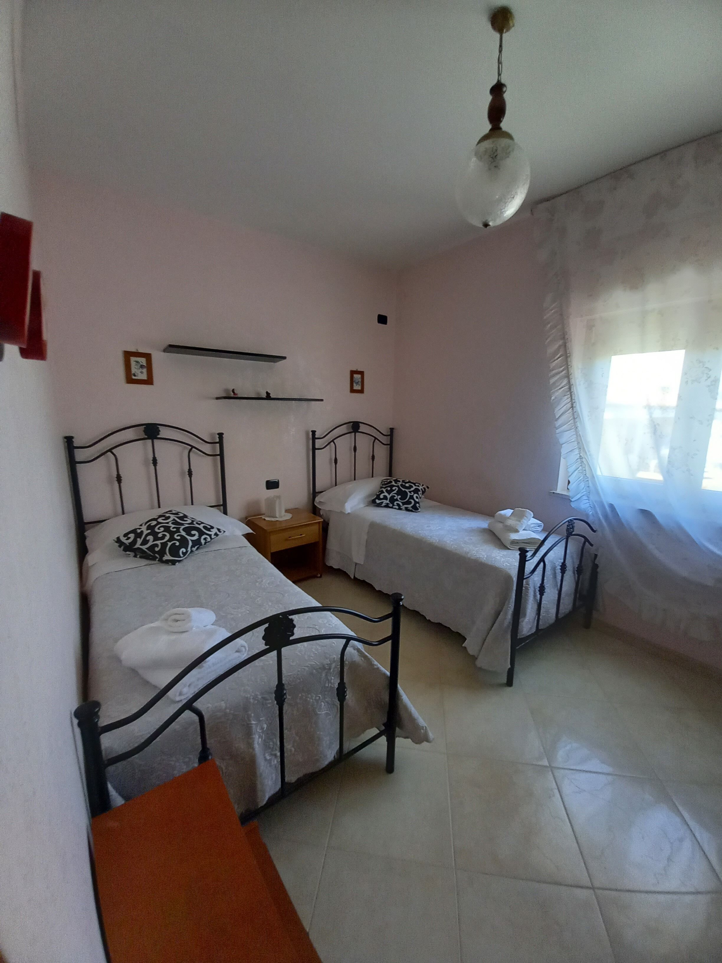 2 bedrooms, iron/ironing board, travel crib, bed sheets