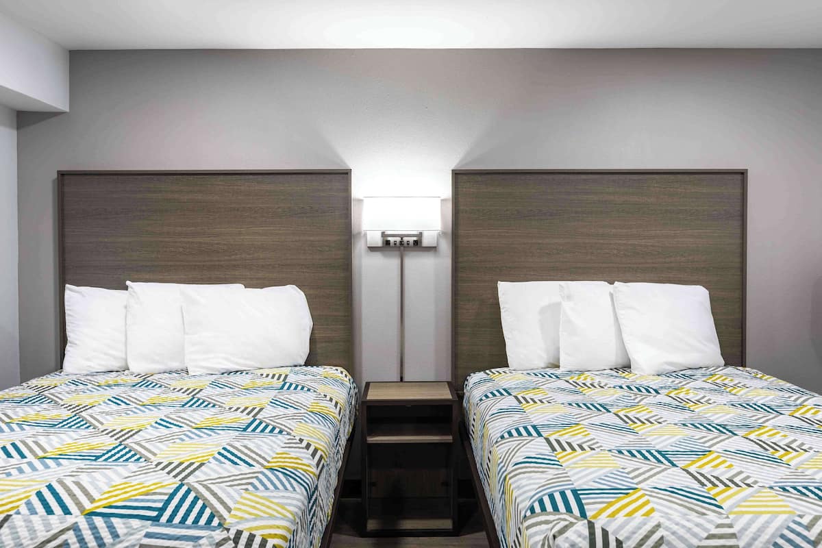 Desk, laptop workspace, blackout curtains, iron/ironing board