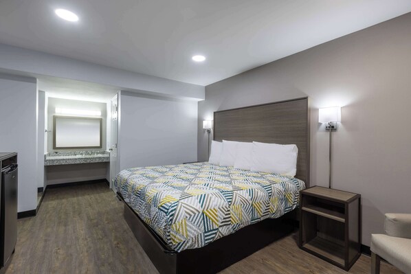 Desk, laptop workspace, blackout curtains, iron/ironing board