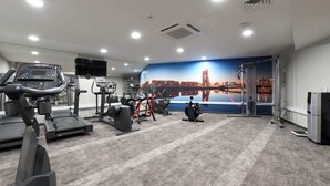 A gym with treadmills, elliptical machines, and weight equipment. - For Students Only Cosy Ensuite Rooms With Private Bathrooms at Dobbie's Point in Glasgow (Glasgow)
