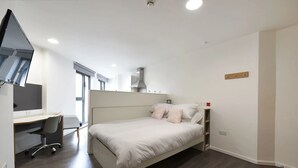 A modern bedroom with a bed, a desk, and a chair. - For Students Only Cosy Ensuite Rooms With Private Bathrooms at Dobbie's Point in Glasgow (Glasgow)