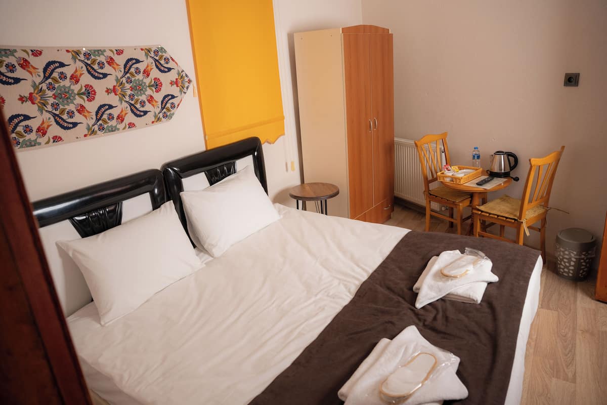 Economy Double or Twin Room, City View | 1 bedroom, soundproofing, free WiFi, bed sheets