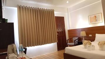 Deluxe Double Room | Premium bedding, desk, laptop workspace, blackout drapes