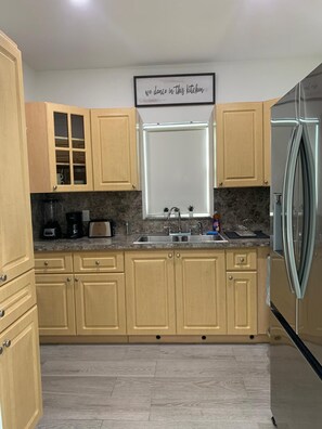 Fridge, microwave, oven, stovetop - Charming 2-Bedroom Home in Prime Miami Location (Miami)