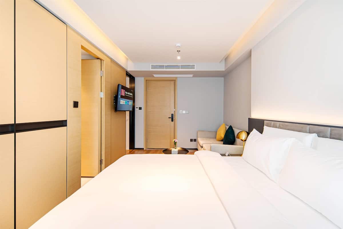 Premium bedding, memory-foam beds, minibar, in-room safe