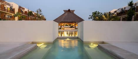 2 outdoor pools, open 9:00 AM to 9:00 PM, pool umbrellas, pool loungers