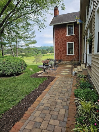 Outdoor dining. The Serene Farm Life...without all the work! Lots of space and privacy!