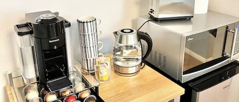 Fridge, microwave, stovetop, coffee/tea maker