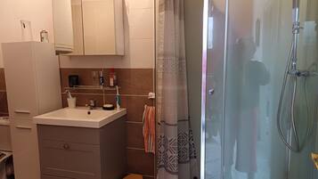 Hair dryer, towels, soap, shampoo