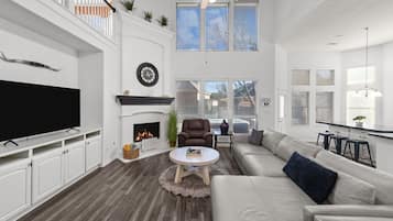 Smart TV, fireplace, books