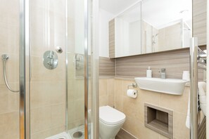 Hair dryer, towels, soap, toilet paper